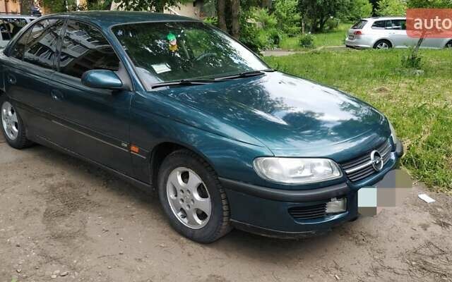 Зеленый Опель Омега, объемом двигателя 2 л и пробегом 350 тыс. км за 1650 $, фото 1 на Automoto.ua