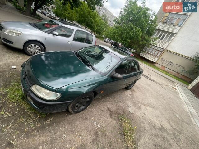 Зеленый Опель Омега, объемом двигателя 2 л и пробегом 400 тыс. км за 1700 $, фото 1 на Automoto.ua