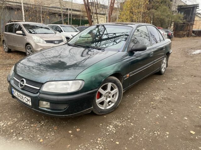 Зеленый Опель Омега, объемом двигателя 2 л и пробегом 200 тыс. км за 1300 $, фото 1 на Automoto.ua