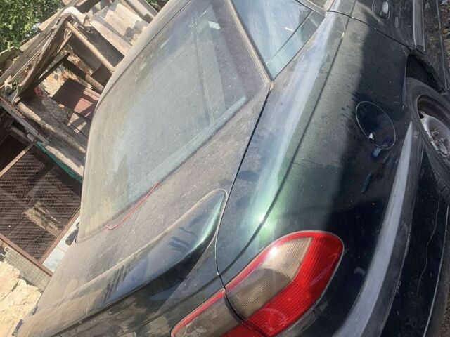 Зеленый Опель Омега, объемом двигателя 2 л и пробегом 185 тыс. км за 1100 $, фото 1 на Automoto.ua