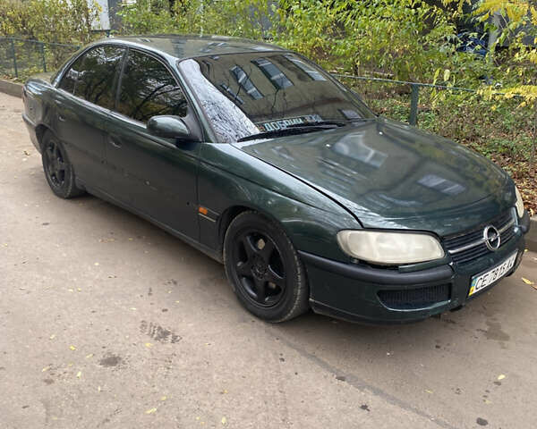 Зеленый Опель Омега, объемом двигателя 2.5 л и пробегом 325 тыс. км за 2350 $, фото 1 на Automoto.ua