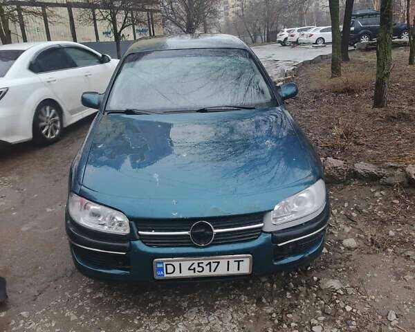 Зеленый Опель Омега, объемом двигателя 2 л и пробегом 230 тыс. км за 2300 $, фото 1 на Automoto.ua