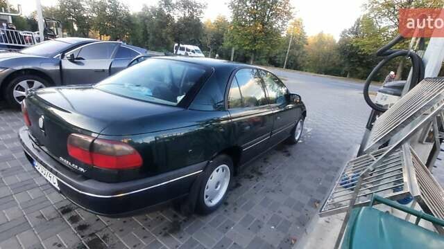 Зеленый Опель Омега, объемом двигателя 2 л и пробегом 158 тыс. км за 3000 $, фото 1 на Automoto.ua