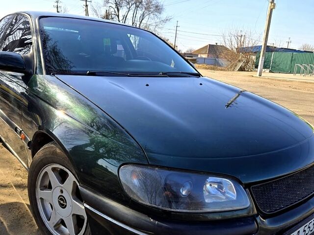 Зеленый Опель Омега, объемом двигателя 2 л и пробегом 0 тыс. км за 2300 $, фото 1 на Automoto.ua