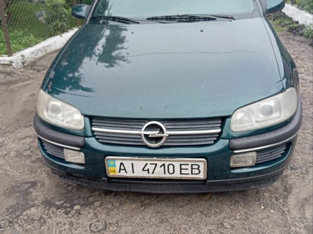 Зеленый Опель Омега, объемом двигателя 2 л и пробегом 350 тыс. км за 1900 $, фото 1 на Automoto.ua