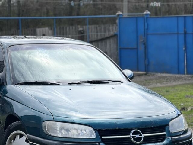 Зеленый Опель Омега, объемом двигателя 2 л и пробегом 331 тыс. км за 900 $, фото 1 на Automoto.ua