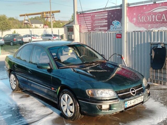 Зеленый Опель Омега, объемом двигателя 2 л и пробегом 514 тыс. км за 1300 $, фото 1 на Automoto.ua