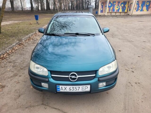 Зеленый Опель Омега, объемом двигателя 2 л и пробегом 350 тыс. км за 2100 $, фото 1 на Automoto.ua