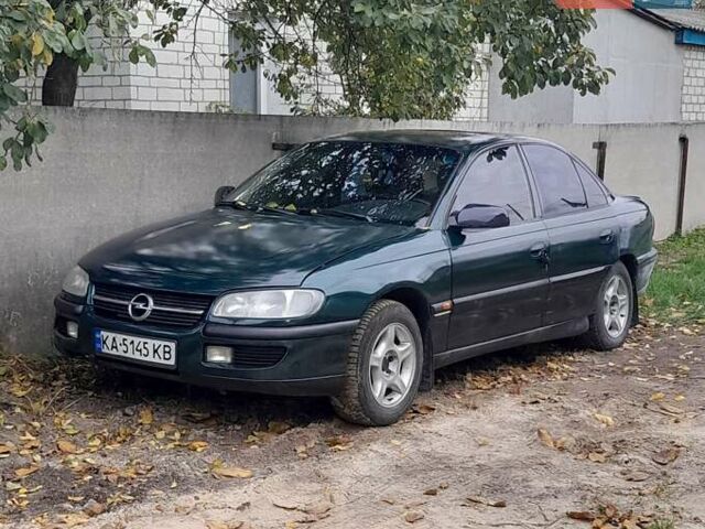 Зеленый Опель Омега, объемом двигателя 2 л и пробегом 350 тыс. км за 1950 $, фото 1 на Automoto.ua