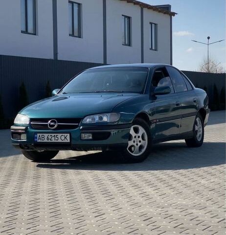 Зеленый Опель Омега, объемом двигателя 2 л и пробегом 400 тыс. км за 2700 $, фото 1 на Automoto.ua