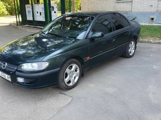Зеленый Опель Омега, объемом двигателя 2 л и пробегом 230 тыс. км за 1550 $, фото 1 на Automoto.ua