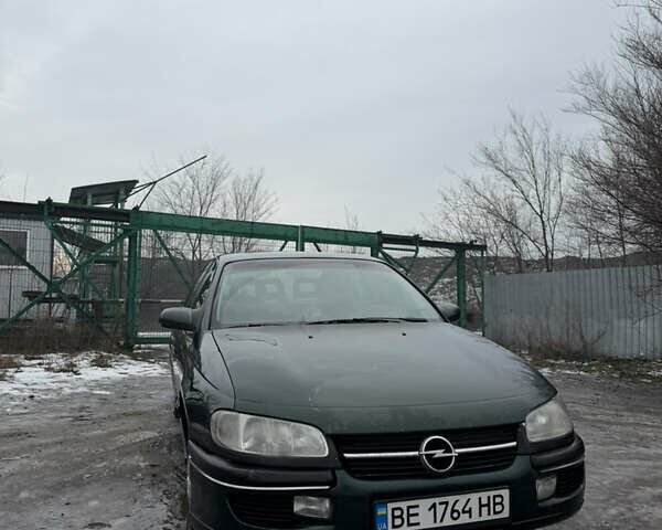 Зеленый Опель Омега, объемом двигателя 2 л и пробегом 320 тыс. км за 1550 $, фото 1 на Automoto.ua