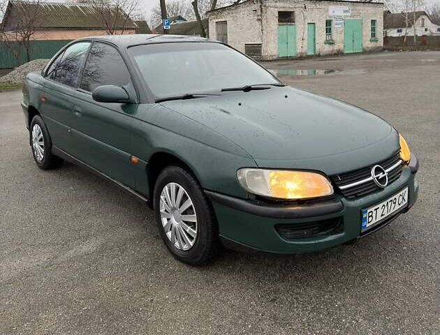 Зелений Опель Омега, об'ємом двигуна 2 л та пробігом 230 тис. км за 1400 $, фото 1 на Automoto.ua