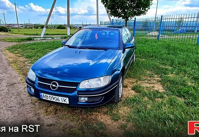 Зеленый Опель Омега, объемом двигателя 2 л и пробегом 245 тыс. км за 2550 $, фото 1 на Automoto.ua