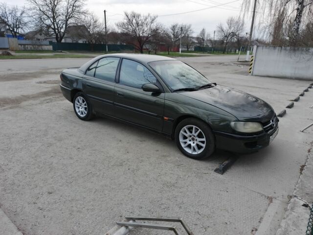 Зеленый Опель Омега, объемом двигателя 2 л и пробегом 355 тыс. км за 1599 $, фото 1 на Automoto.ua