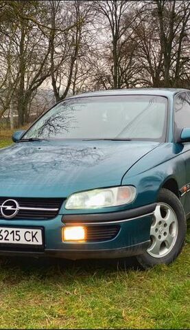 Зеленый Опель Омега, объемом двигателя 2 л и пробегом 377 тыс. км за 2500 $, фото 1 на Automoto.ua