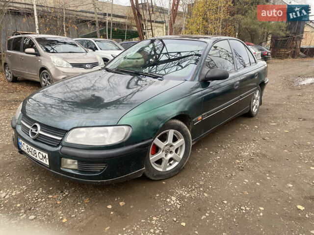 Зелений Опель Омега, об'ємом двигуна 2 л та пробігом 300 тис. км за 1300 $, фото 1 на Automoto.ua