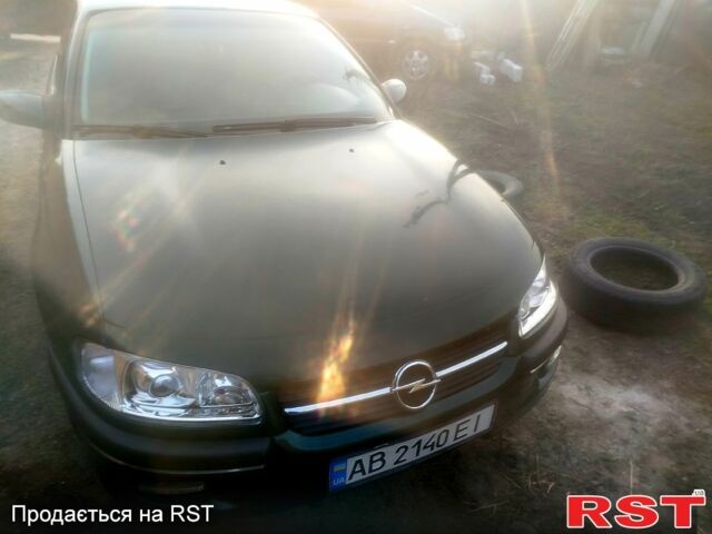 Зеленый Опель Омега, объемом двигателя 2 л и пробегом 300 тыс. км за 2600 $, фото 1 на Automoto.ua