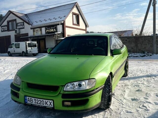 Зеленый Опель Омега, объемом двигателя 3 л и пробегом 400 тыс. км за 2200 $, фото 1 на Automoto.ua