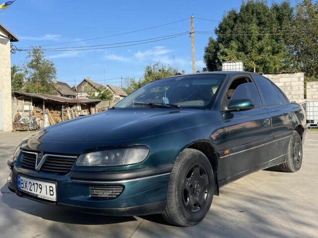 Зеленый Опель Омега, объемом двигателя 2 л и пробегом 300 тыс. км за 1800 $, фото 1 на Automoto.ua