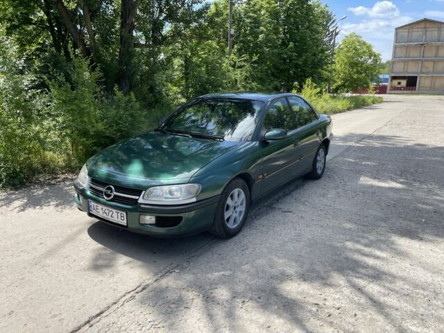 Зелений Опель Омега, об'ємом двигуна 2 л та пробігом 300 тис. км за 2100 $, фото 1 на Automoto.ua