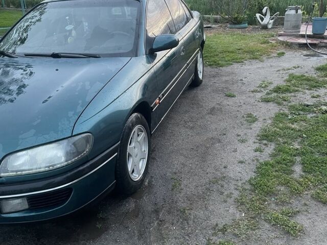 Зеленый Опель Омега, объемом двигателя 2 л и пробегом 3 тыс. км за 1900 $, фото 1 на Automoto.ua