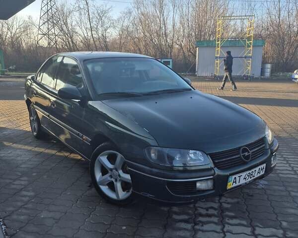 Зеленый Опель Омега, объемом двигателя 2.6 л и пробегом 270 тыс. км за 2500 $, фото 1 на Automoto.ua