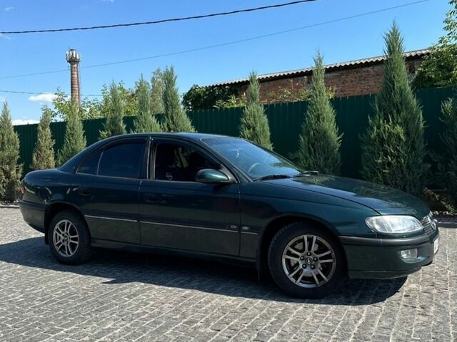 Зелений Опель Омега, об'ємом двигуна 2 л та пробігом 268 тис. км за 1700 $, фото 1 на Automoto.ua