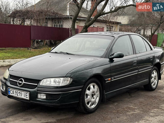 Зеленый Опель Омега, объемом двигателя 2.5 л и пробегом 180 тыс. км за 1499 $, фото 1 на Automoto.ua