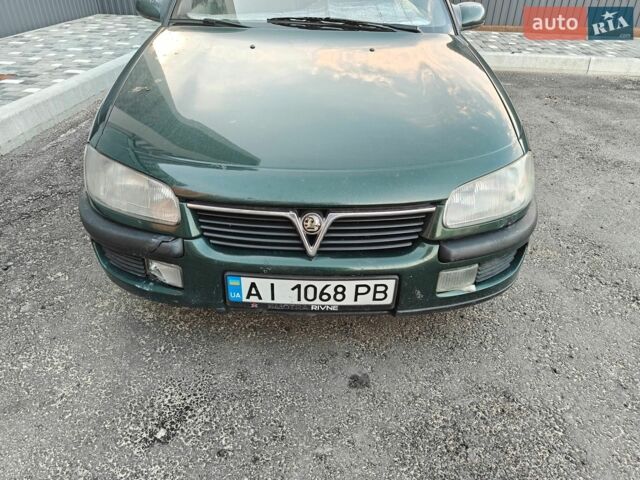 Зеленый Опель Омега, объемом двигателя 2 л и пробегом 395 тыс. км за 1500 $, фото 1 на Automoto.ua