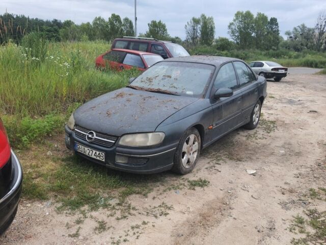 Зелений Опель Омега, об'ємом двигуна 2 л та пробігом 400 тис. км за 500 $, фото 1 на Automoto.ua