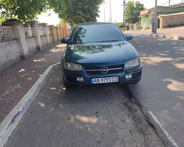 Зеленый Опель Омега, объемом двигателя 2 л и пробегом 200 тыс. км за 2200 $, фото 1 на Automoto.ua