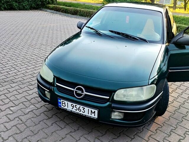 Зелений Опель Омега, об'ємом двигуна 2 л та пробігом 235 тис. км за 1899 $, фото 1 на Automoto.ua