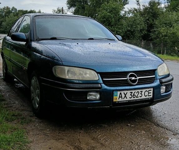 Зеленый Опель Омега, объемом двигателя 2 л и пробегом 318 тыс. км за 2148 $, фото 1 на Automoto.ua
