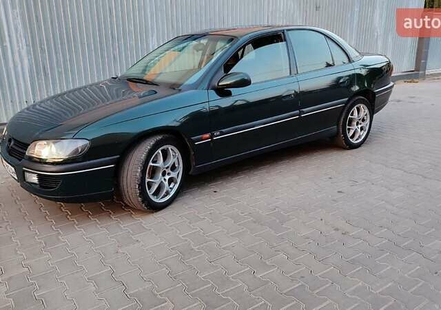 Зелений Опель Омега, об'ємом двигуна 2.6 л та пробігом 269 тис. км за 2500 $, фото 1 на Automoto.ua