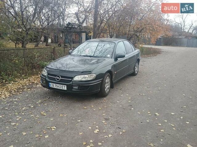 Зеленый Опель Омега, объемом двигателя 2 л и пробегом 380 тыс. км за 2800 $, фото 1 на Automoto.ua