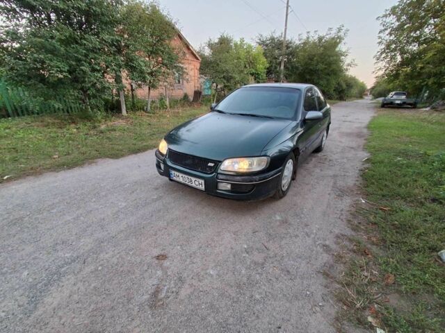 Зелений Опель Омега, об'ємом двигуна 2 л та пробігом 250 тис. км за 1495 $, фото 1 на Automoto.ua