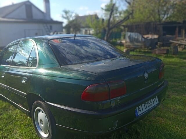 Зелений Опель Омега, об'ємом двигуна 2 л та пробігом 250 тис. км за 1700 $, фото 1 на Automoto.ua