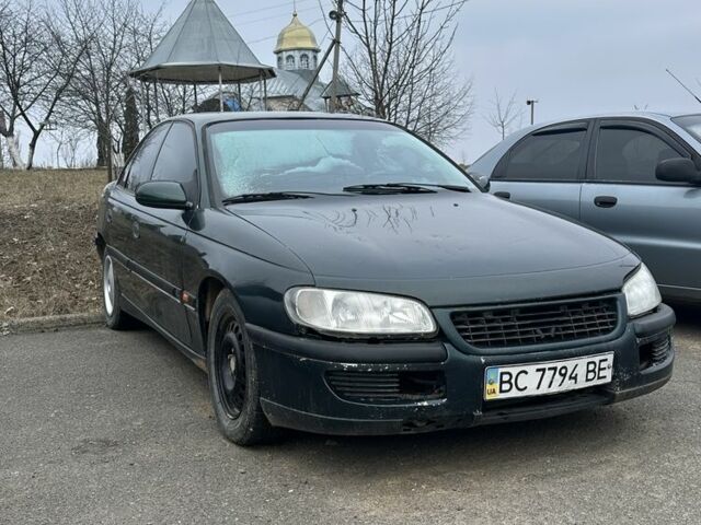 Зеленый Опель Омега, объемом двигателя 2.5 л и пробегом 340 тыс. км за 600 $, фото 1 на Automoto.ua