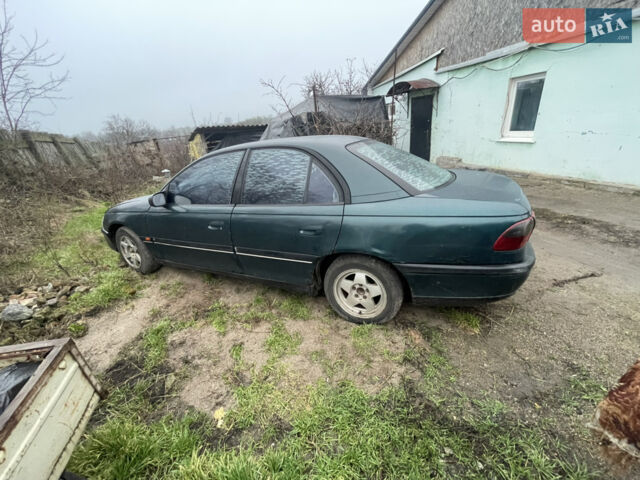 Зеленый Опель Омега, объемом двигателя 2 л и пробегом 313 тыс. км за 1456 $, фото 1 на Automoto.ua