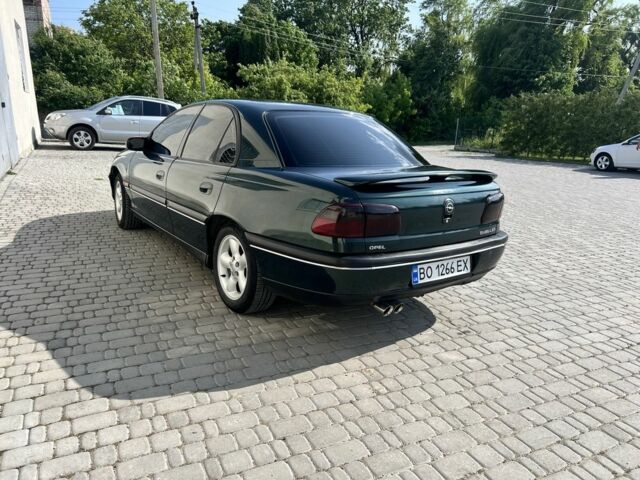 Зеленый Опель Омега, объемом двигателя 2 л и пробегом 240 тыс. км за 3500 $, фото 1 на Automoto.ua