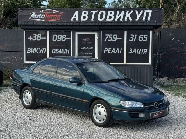 Зелений Опель Омега, об'ємом двигуна 2 л та пробігом 365 тис. км за 1997 $, фото 1 на Automoto.ua