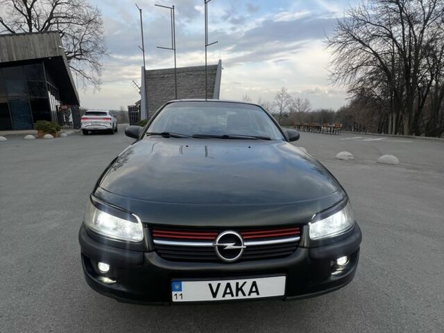 Зеленый Опель Омега, объемом двигателя 2 л и пробегом 270 тыс. км за 2800 $, фото 1 на Automoto.ua