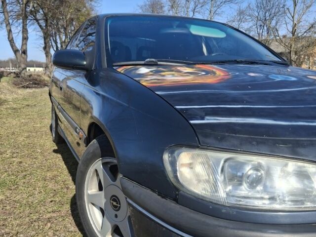 Зеленый Опель Омега, объемом двигателя 2 л и пробегом 340 тыс. км за 1450 $, фото 1 на Automoto.ua