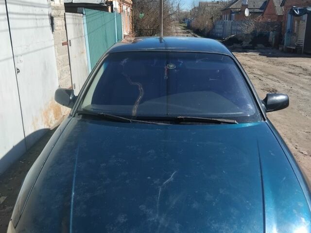 Зеленый Опель Омега, объемом двигателя 2 л и пробегом 290 тыс. км за 1700 $, фото 1 на Automoto.ua