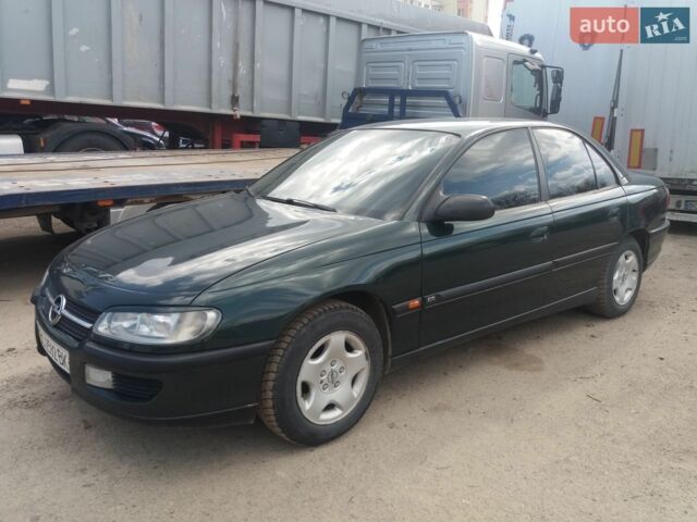 Зеленый Опель Омега, объемом двигателя 2 л и пробегом 330 тыс. км за 2900 $, фото 1 на Automoto.ua