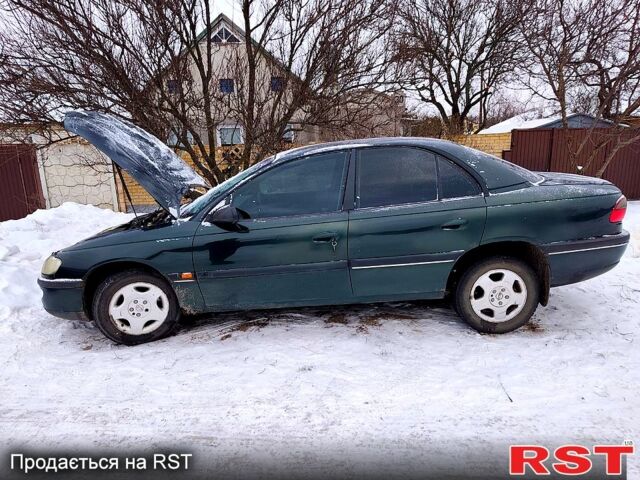 Зеленый Опель Омега, объемом двигателя 2 л и пробегом 280 тыс. км за 1550 $, фото 1 на Automoto.ua