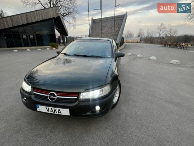 Зеленый Опель Омега, объемом двигателя 2 л и пробегом 270 тыс. км за 2400 $, фото 1 на Automoto.ua