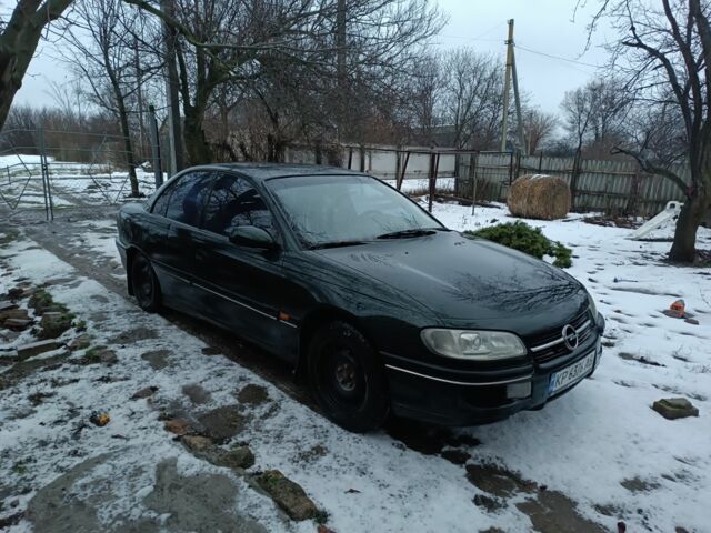 Зеленый Опель Омега, объемом двигателя 2 л и пробегом 300 тыс. км за 1000 $, фото 1 на Automoto.ua