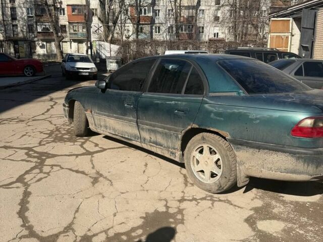 Зелений Опель Омега, об'ємом двигуна 2 л та пробігом 250 тис. км за 700 $, фото 1 на Automoto.ua